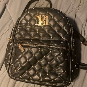 MB Logo black faux leather backpack bag with gold studs
